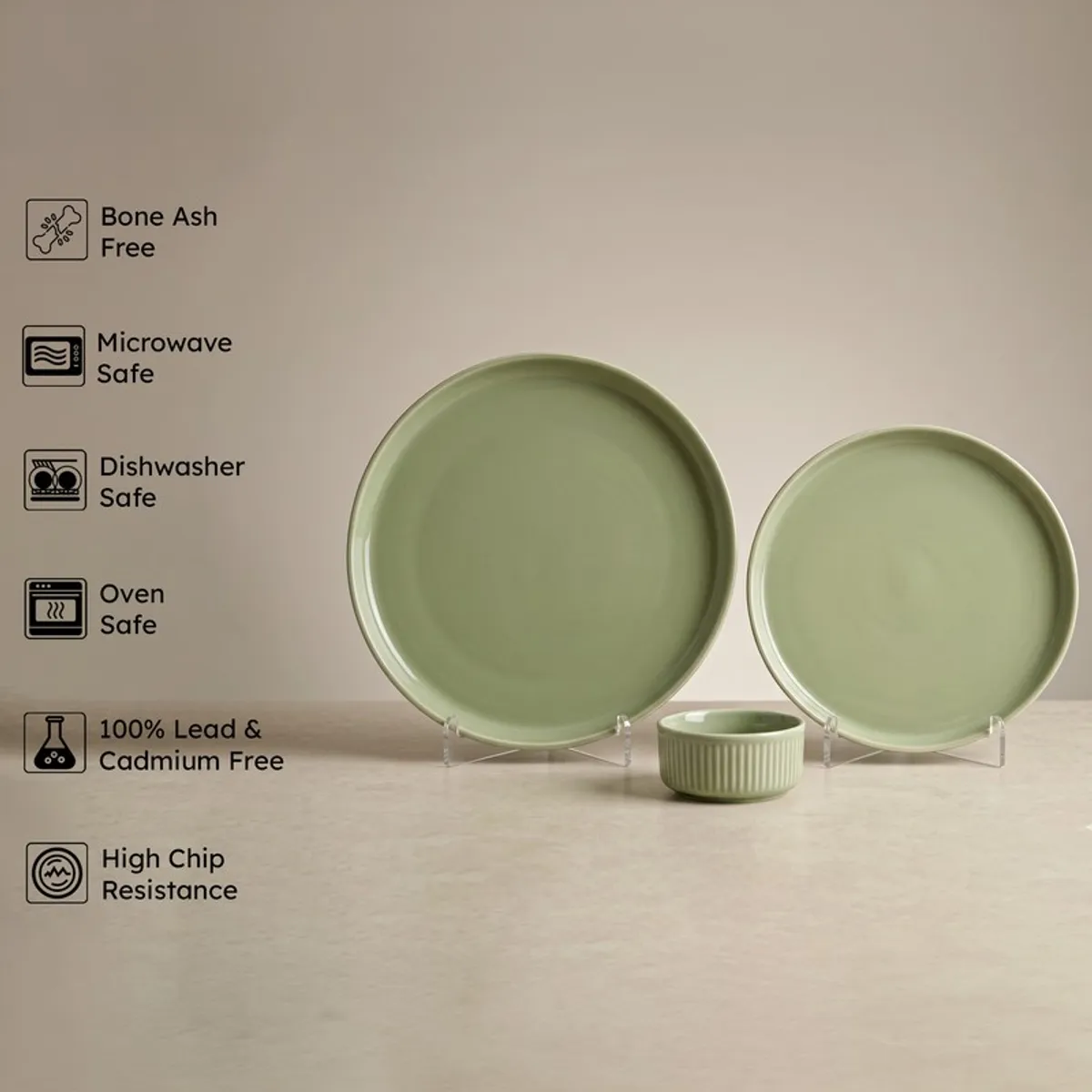 Sage green plates and bowl displayed together with feature icons beside them