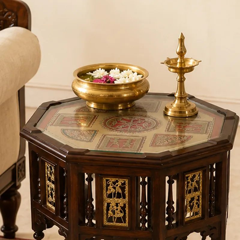 Close view of the octagonal tabletop with decorative motif and carved sides