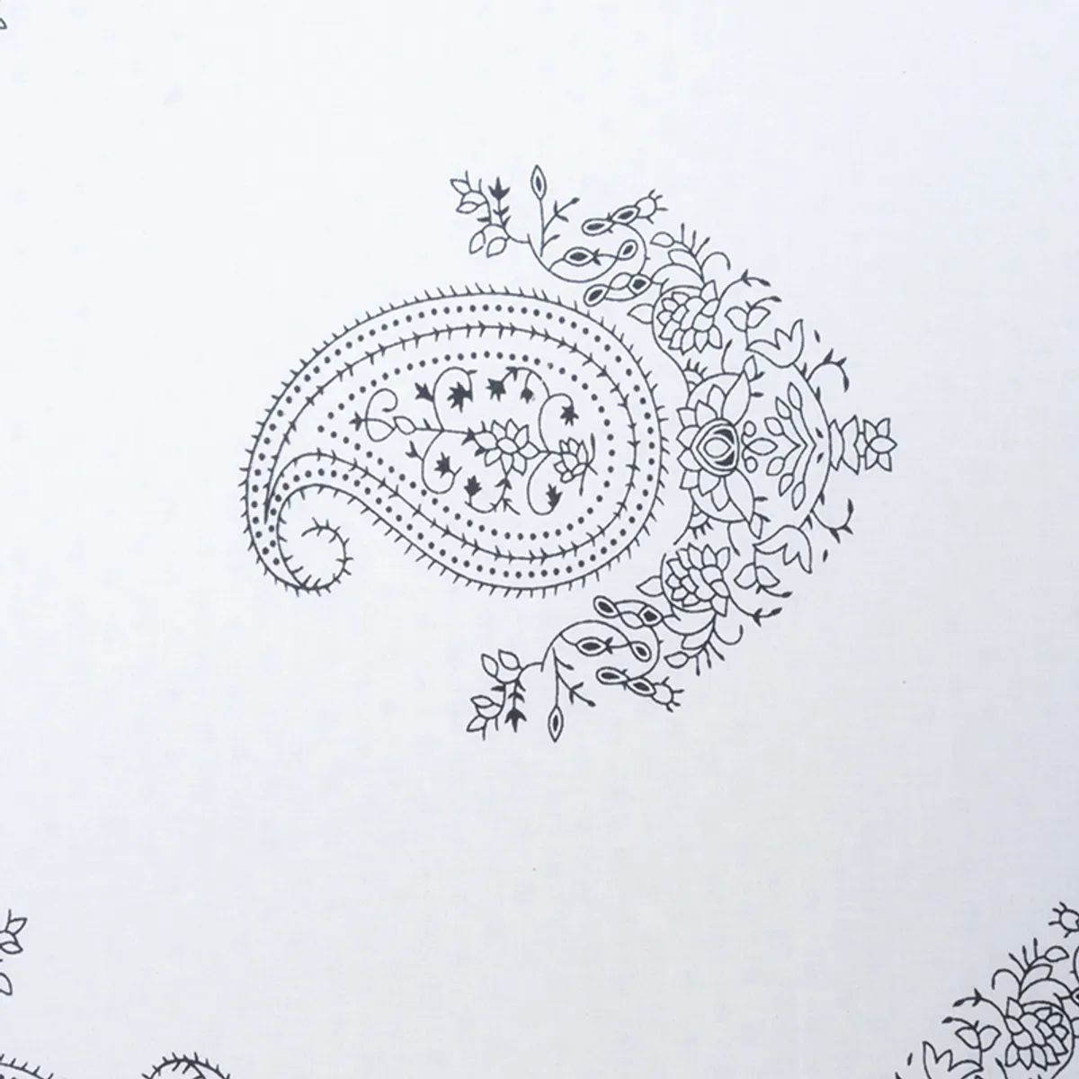 White fabric featuring a black paisley and floral print