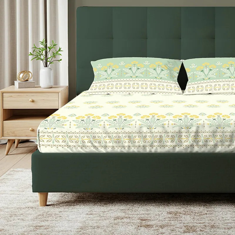 Close front view of floral fitted bedsheet with border print and matching pillow covers