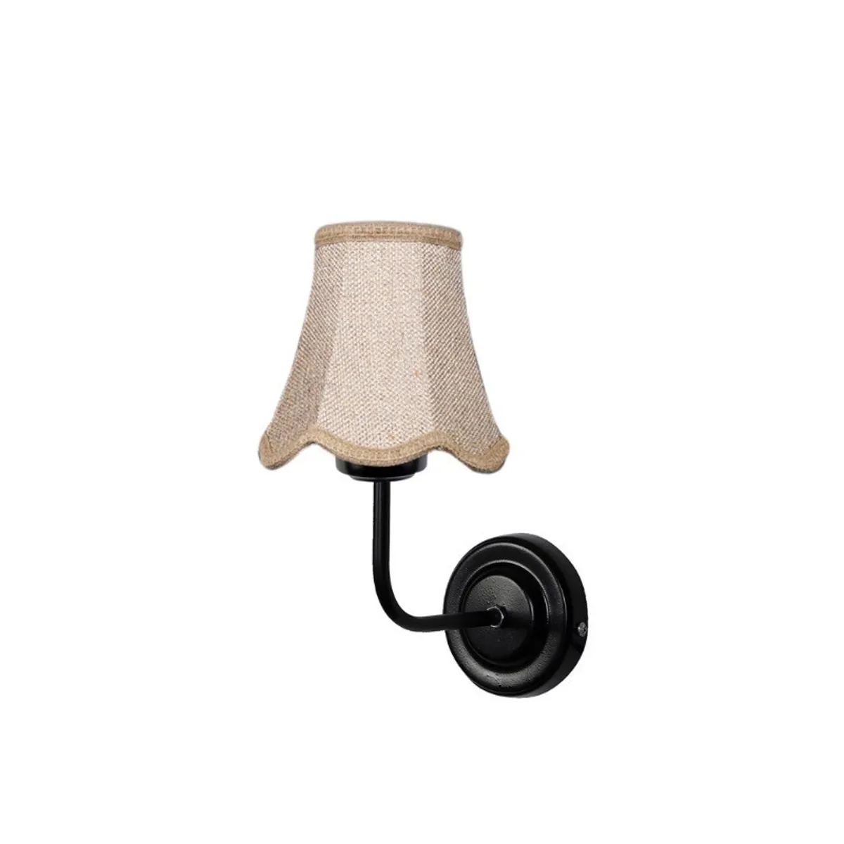 Angled view of a beige-shade black wall lamp on a white background