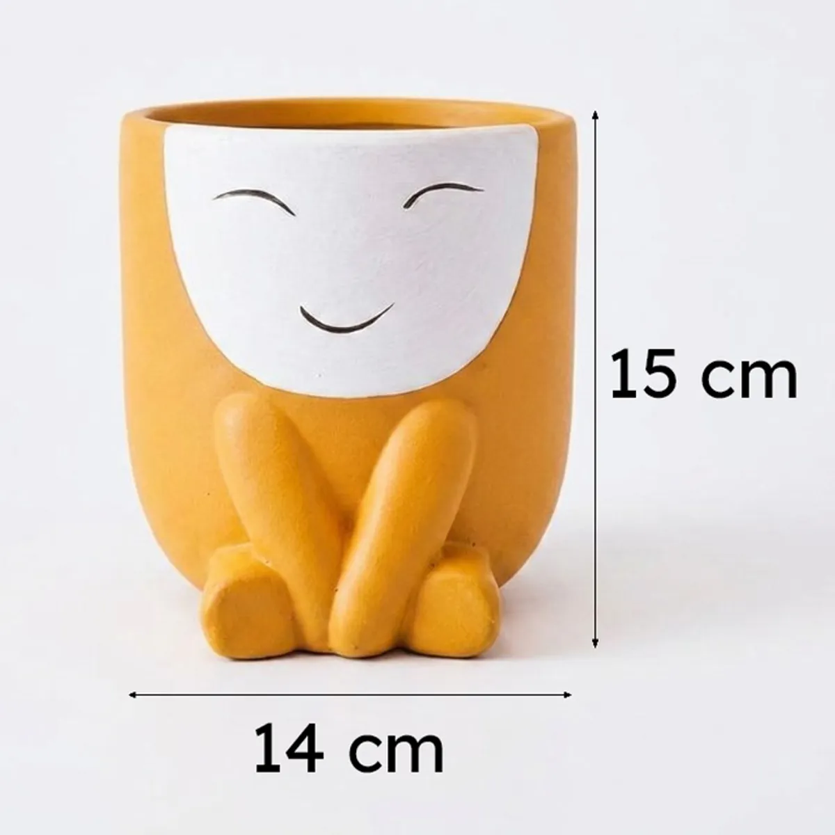 Orange smiling face planter on a plain background with dimension arrows