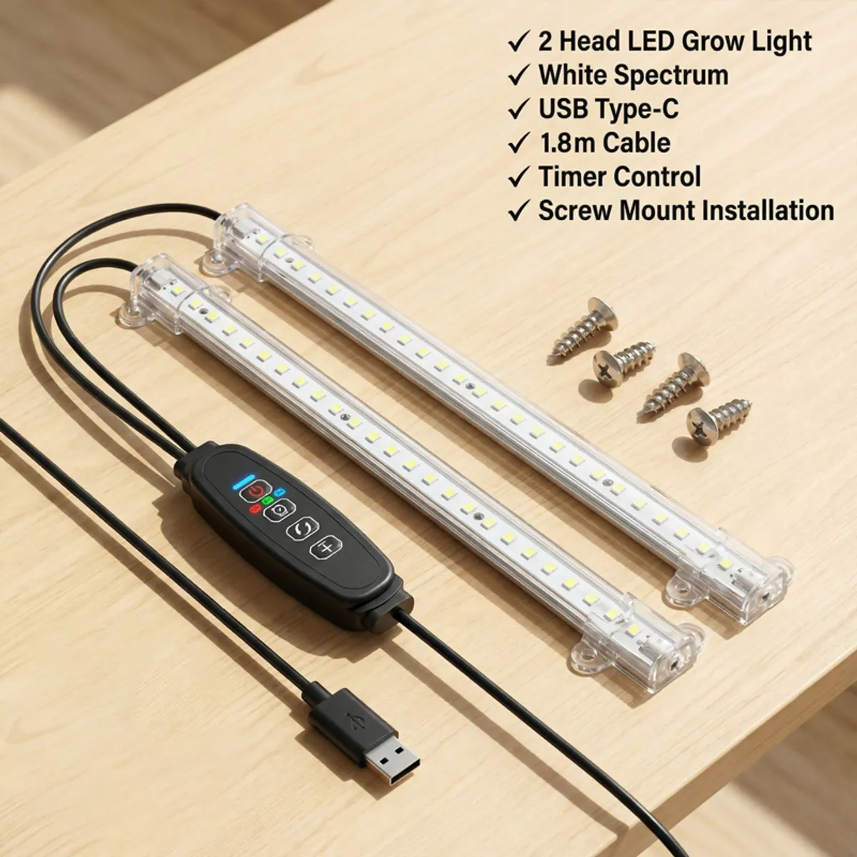 Two LED grow light bars with controller, USB cable and mounting screws on a table