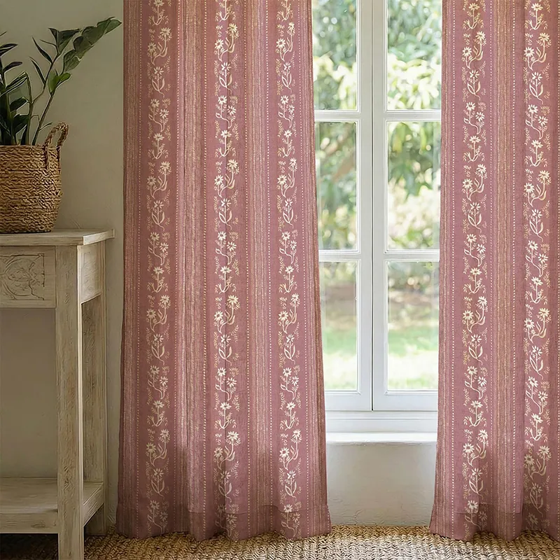 Pair of pink floral curtains framing a window