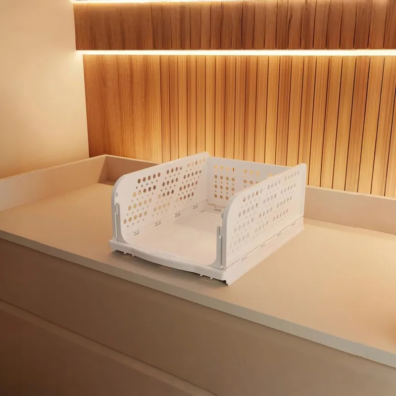 Empty white perforated organiser displayed on a shelf