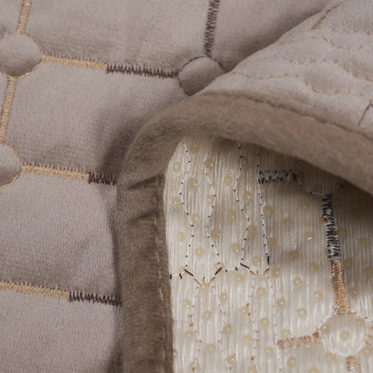 Close-up of the cover's soft brown edge and underside