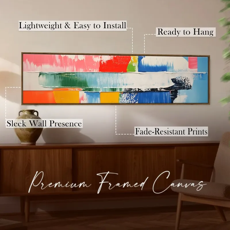 Long framed abstract canvas displayed above a wooden console in a warm interior.