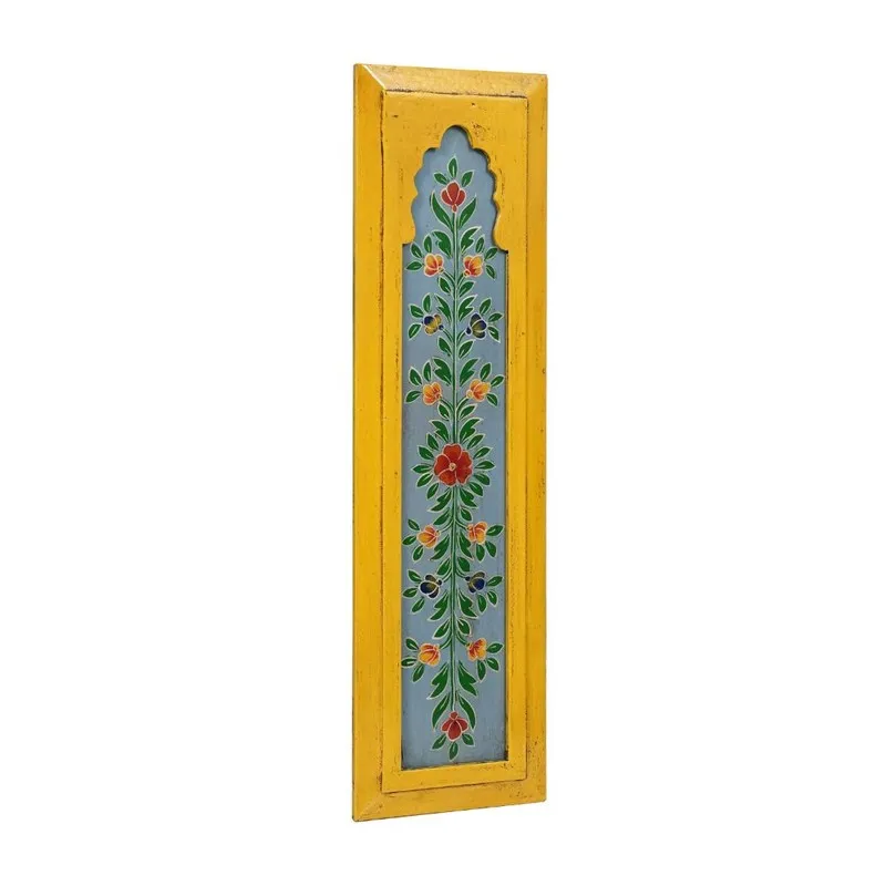 Angled view of a yellow rectangular wall accent with painted floral motif