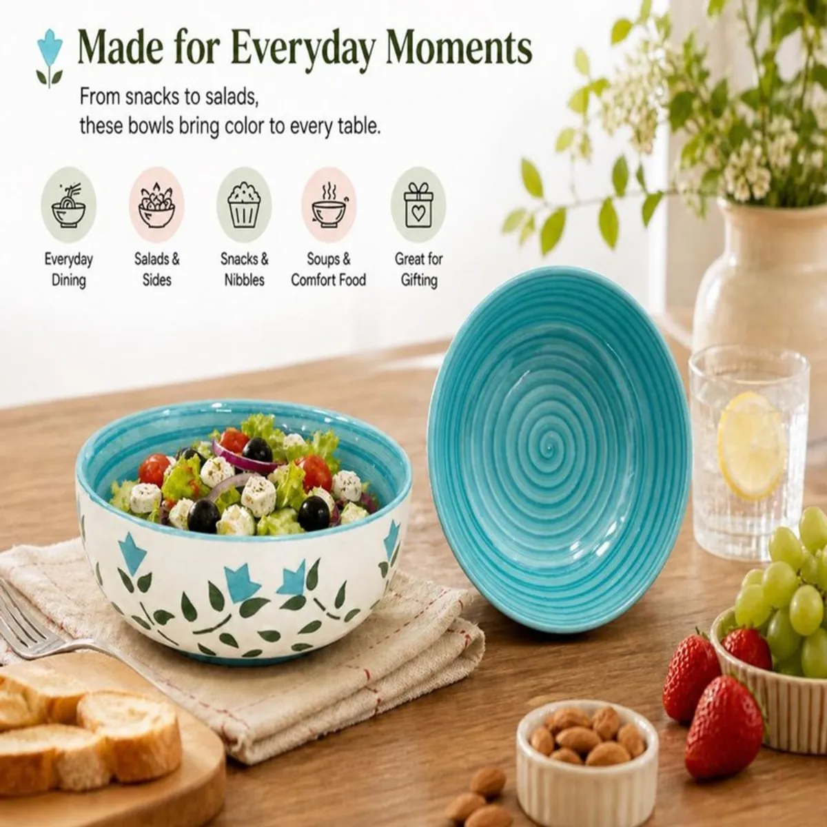 Floral ceramic bowl serving salad beside its matching bowl