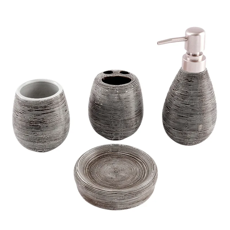 Four black ribbed ceramic bathroom accessories displayed on a white background