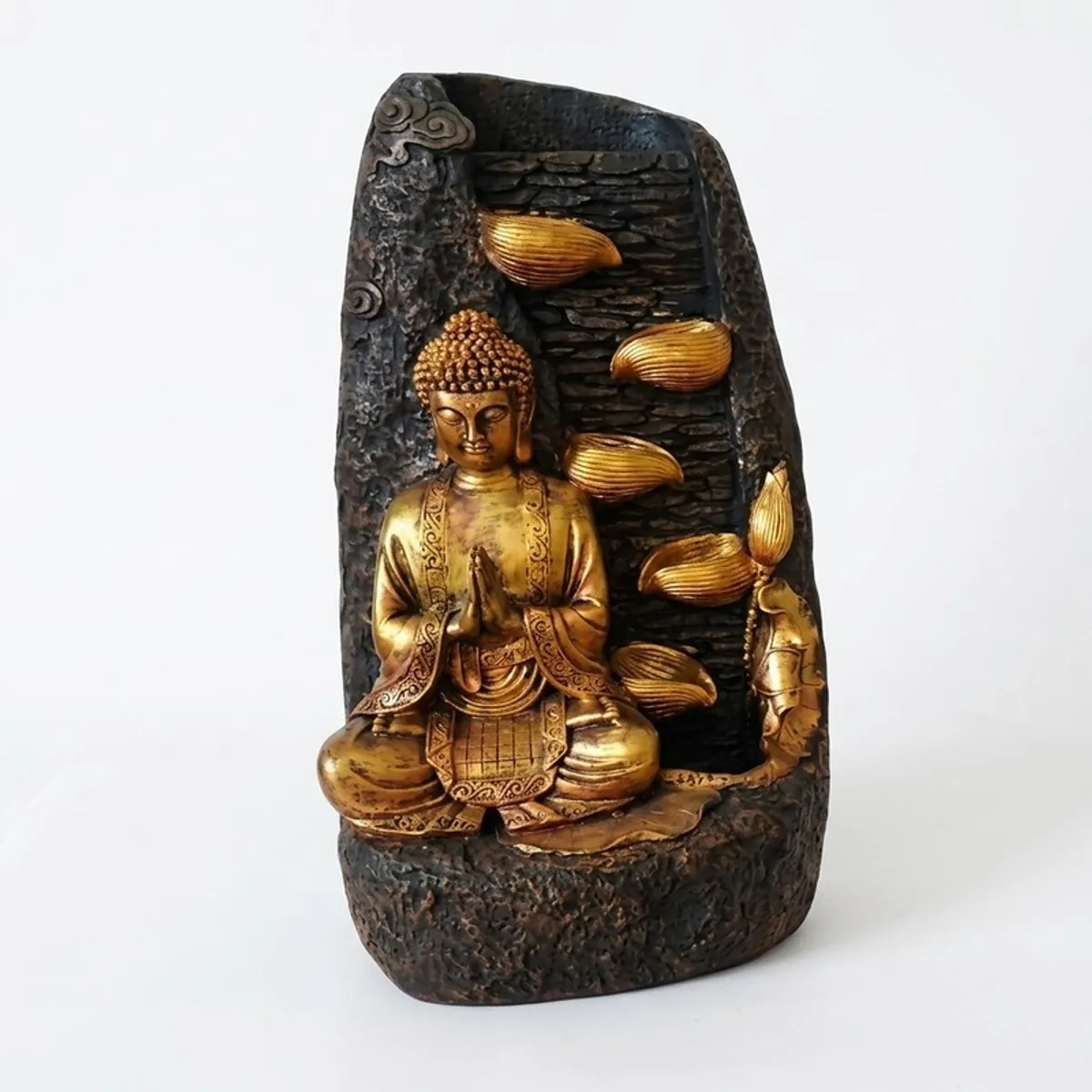 Front view of a sculptural black and gold Buddha water fountain