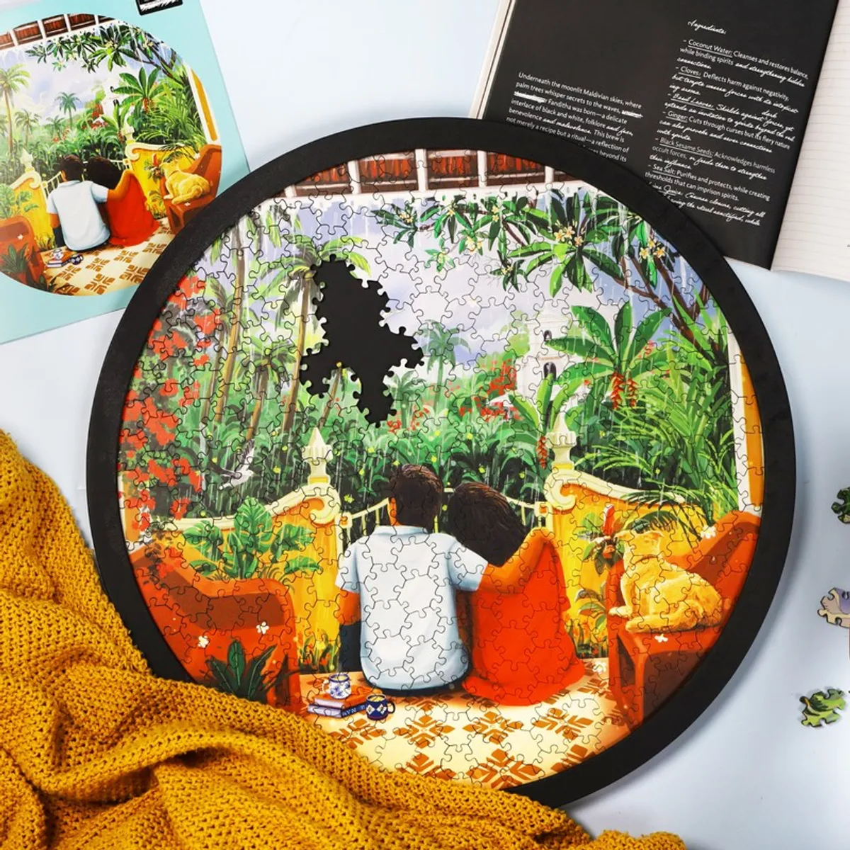 Close view of the round puzzle wall art showing the illustrated tropical scene