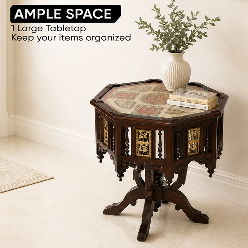 Dark brown side table with patterned top styled with a vase and books