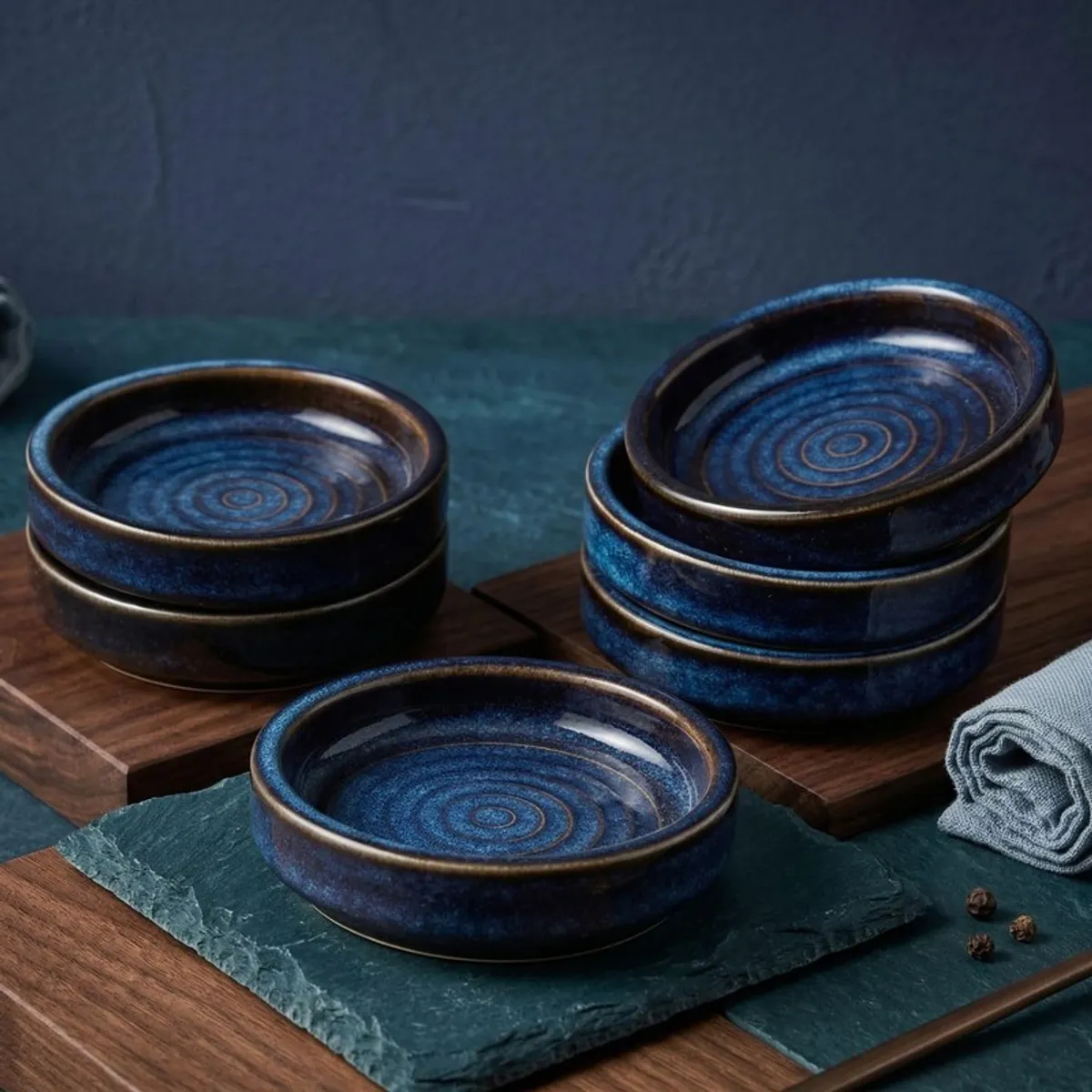 Blue ceramic dip bowls with concentric inner pattern and contrasting rim