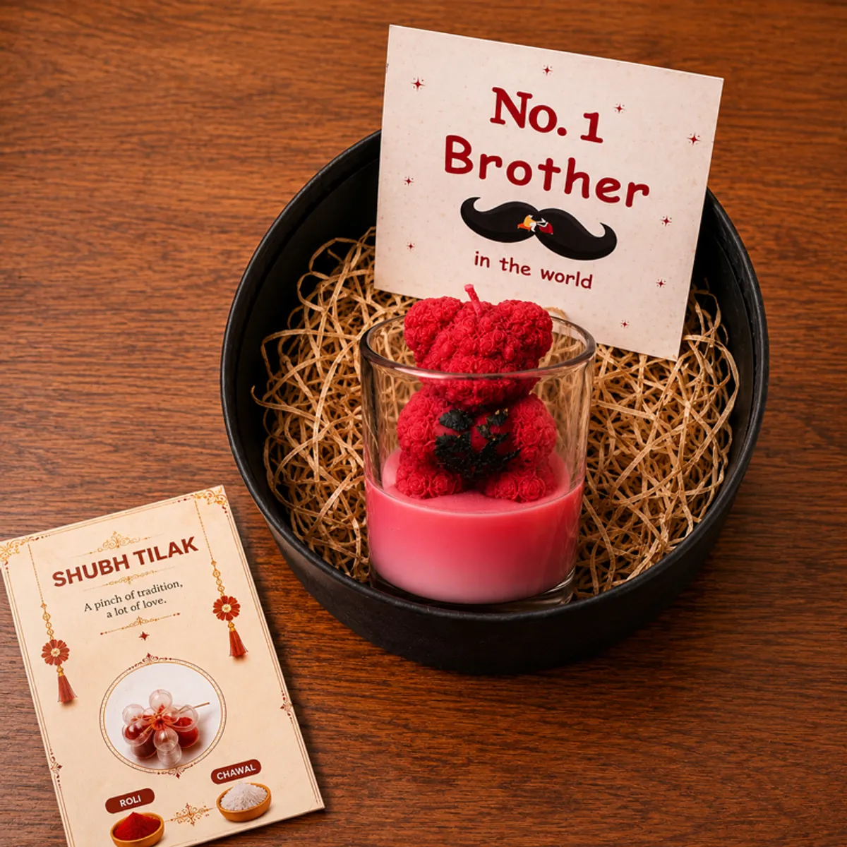 Teddy candle and brother card arranged in a black gift box with festive card