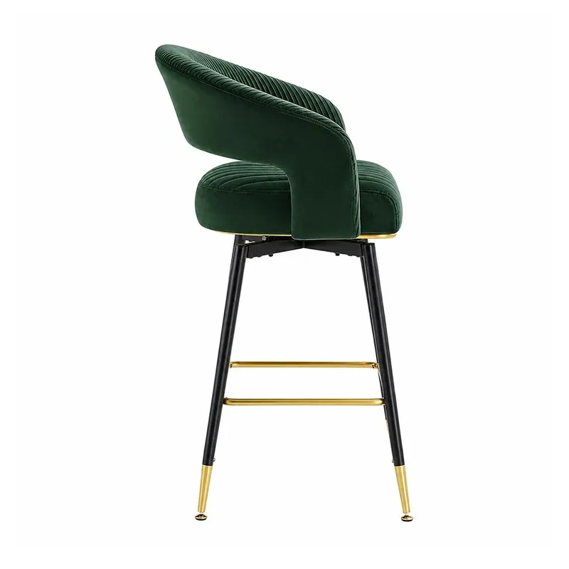 Side view showing the curved back and black metal legs of a green bar stool.
