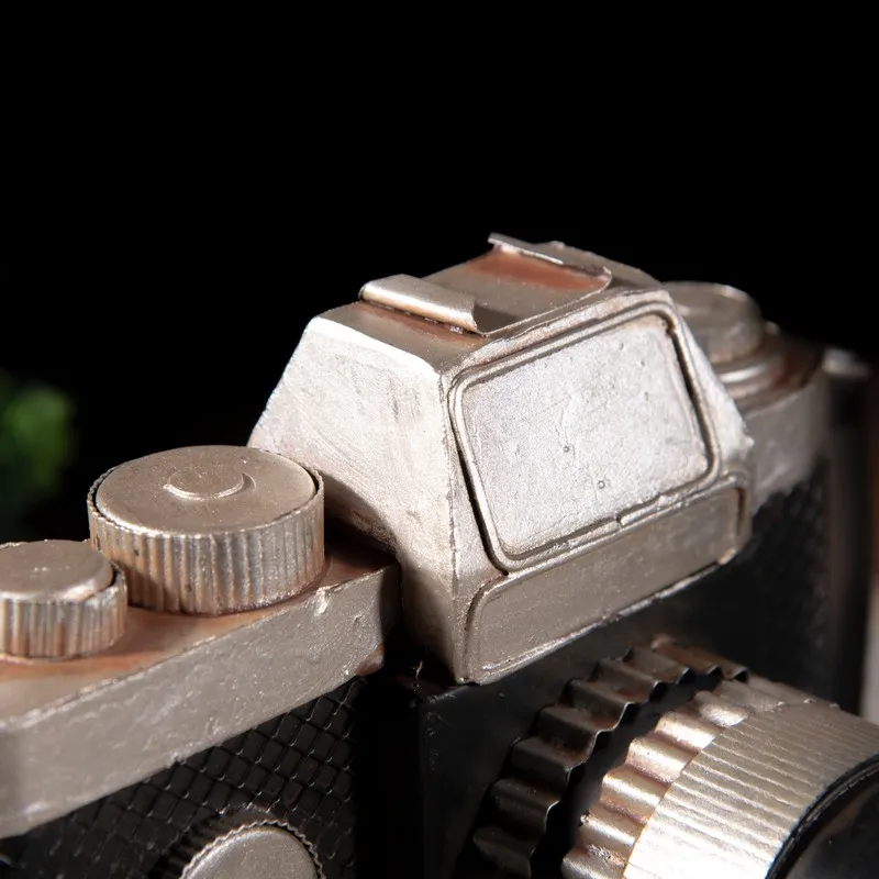 Close-up of the top and lens details of the camera-shaped showpiece
