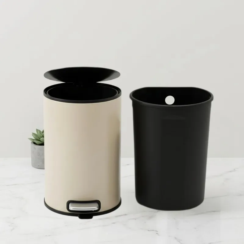 Beige dustbin with lid open beside removable black inner bucket