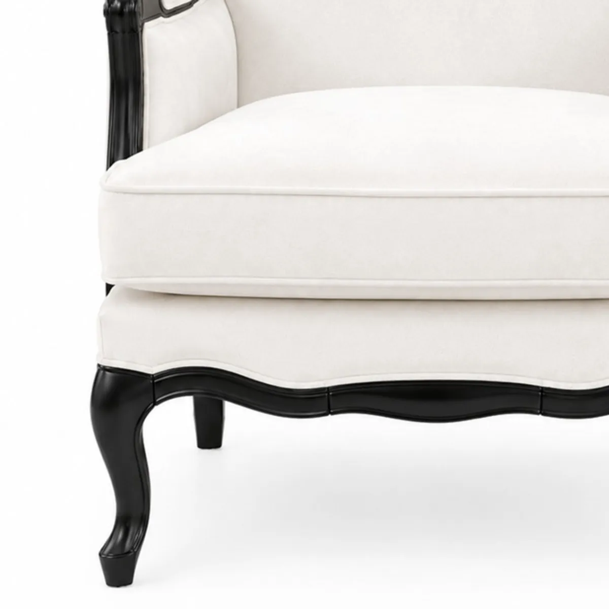 Close-up of the chair's white seat and curved dark wood-style frame