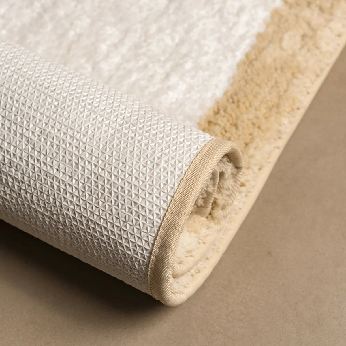 Rolled runner rug showing its textured anti-skid backing