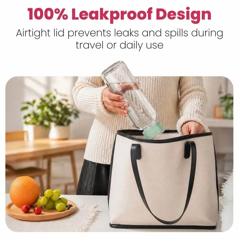 Transparent glass water bottle being placed into a tote bag.