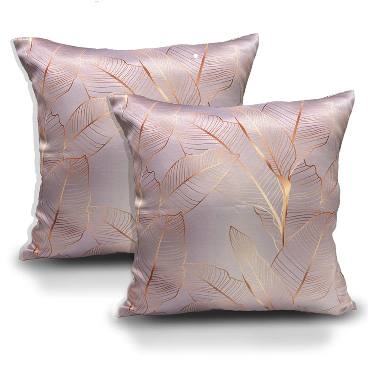 Two pink and gold leaf-print square cushion covers shown against a white background