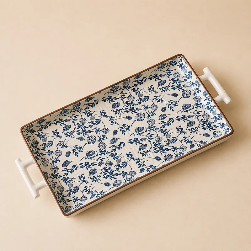 Blue and white floral ceramic serving tray with raised handles