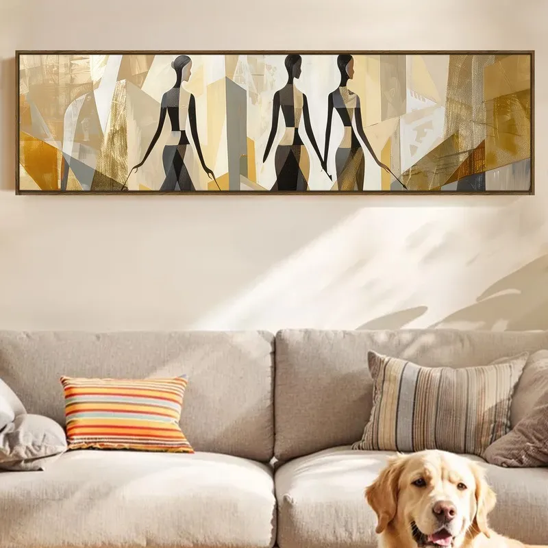 Panoramic framed silhouette wall art displayed above a beige sofa