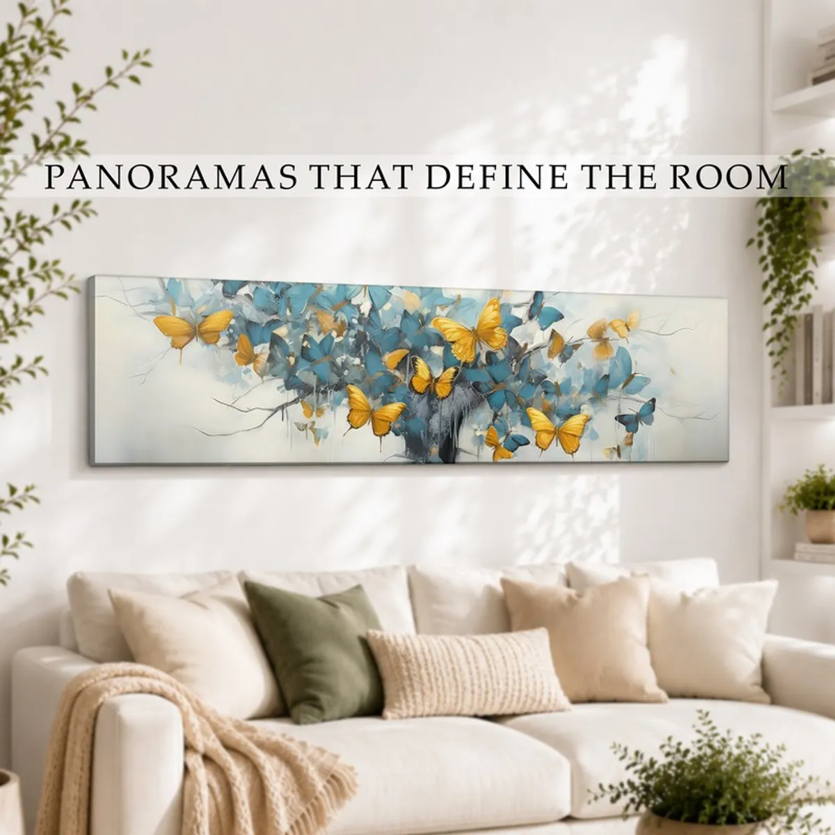 Wide butterfly canvas wall art styled above a cream sofa in a sunlit room