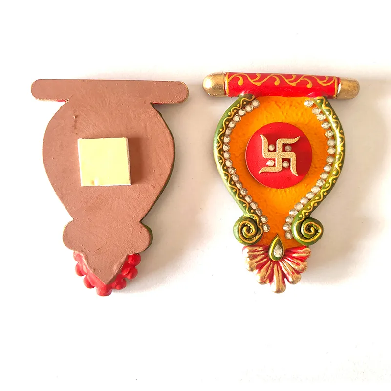 Back and front view of Sacred Swastik wall accent with adhesive pad