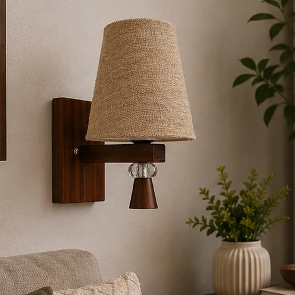 Wall-mounted brown wood lamp with a textured jute shade in a living room.