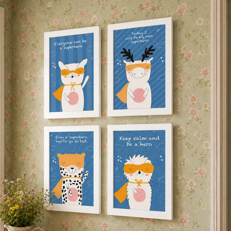 Set of four framed blue superhero animal art prints on floral wallpaper