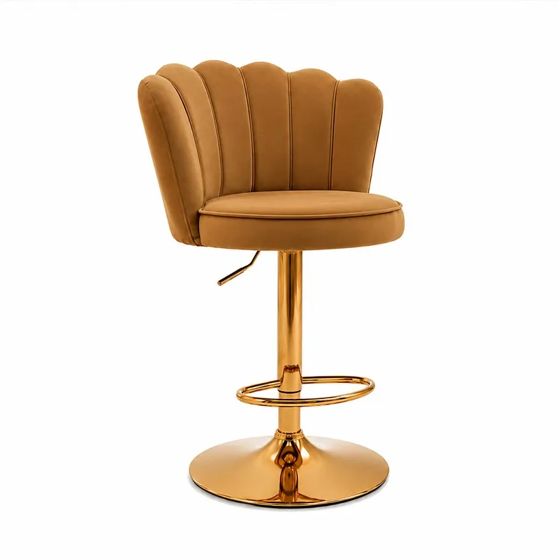 Angled view of brown velvet bar chair with curved back and gold-toned metal base