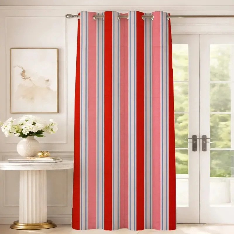Red and pink striped eyelet curtain styled in front of French doors