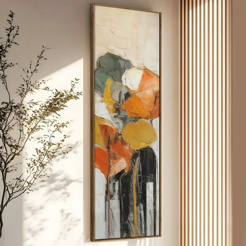 Vertical view of framed abstract canvas art with orange, yellow, black and muted green forms