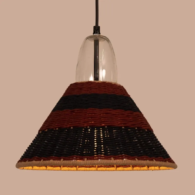 Lit red and black striped ceiling lamp against a beige background
