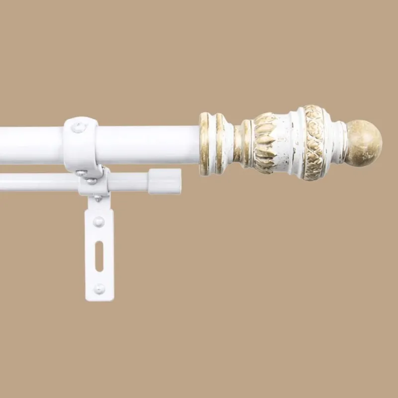 Close-up of white double curtain rod with decorative urn finial and bracket