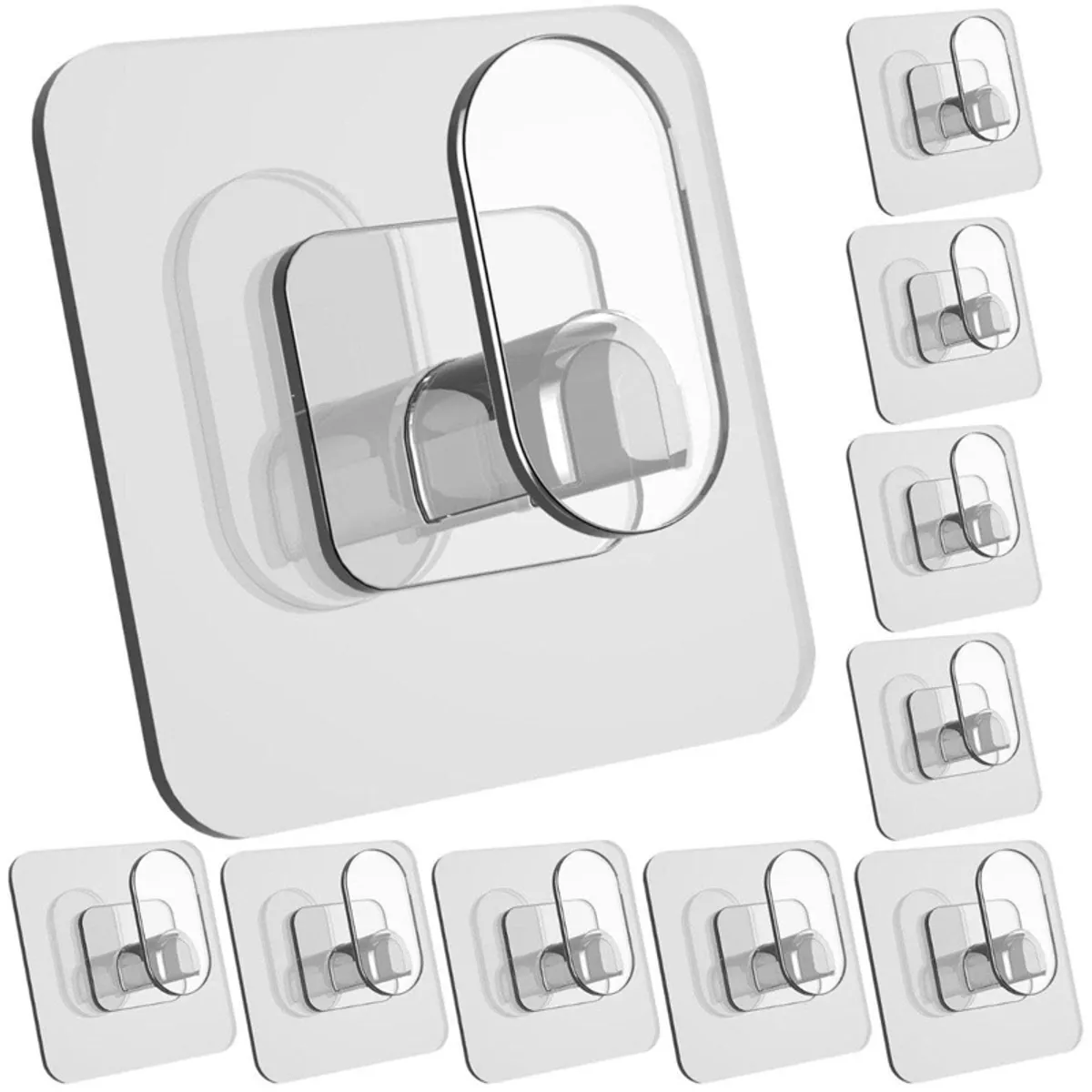 Close-up of a transparent adhesive wall hook with five additional hooks displayed beside it.