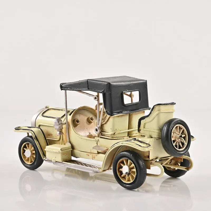 Back angled view of the light yellow retro car showpiece