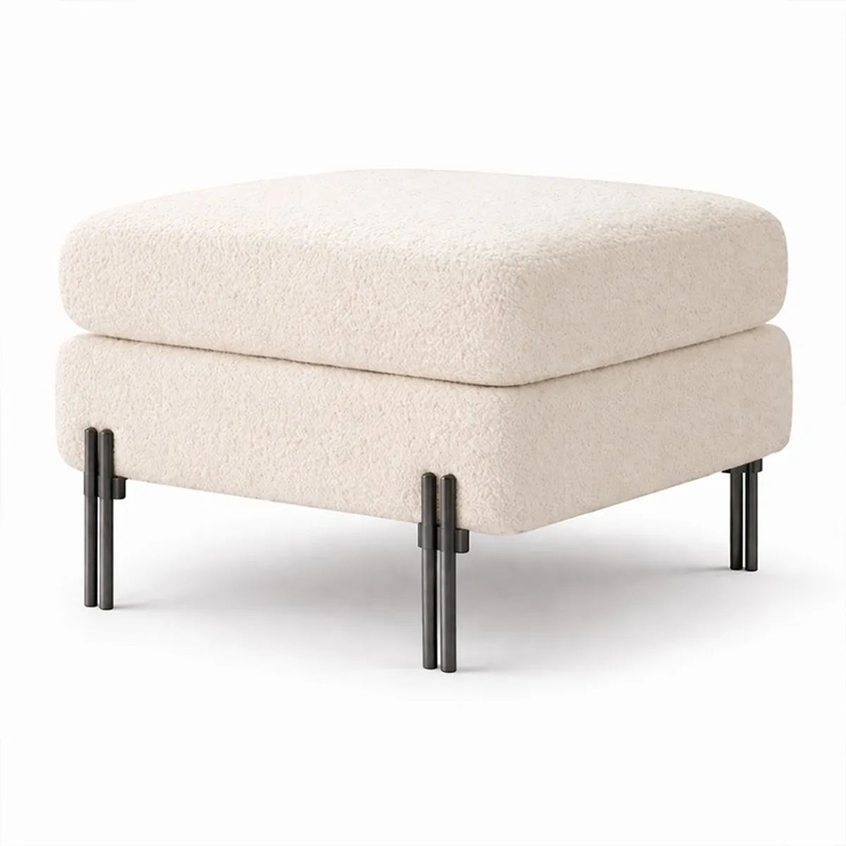 White bouclé ottoman shown against a plain white background
