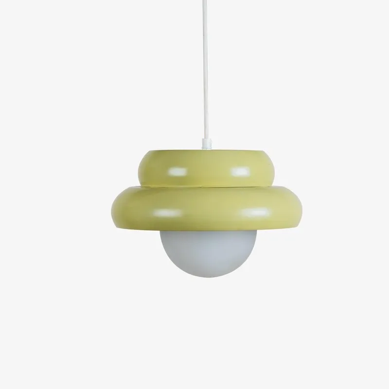 Pistachio green ceiling lamp suspended on a white cord against a plain background