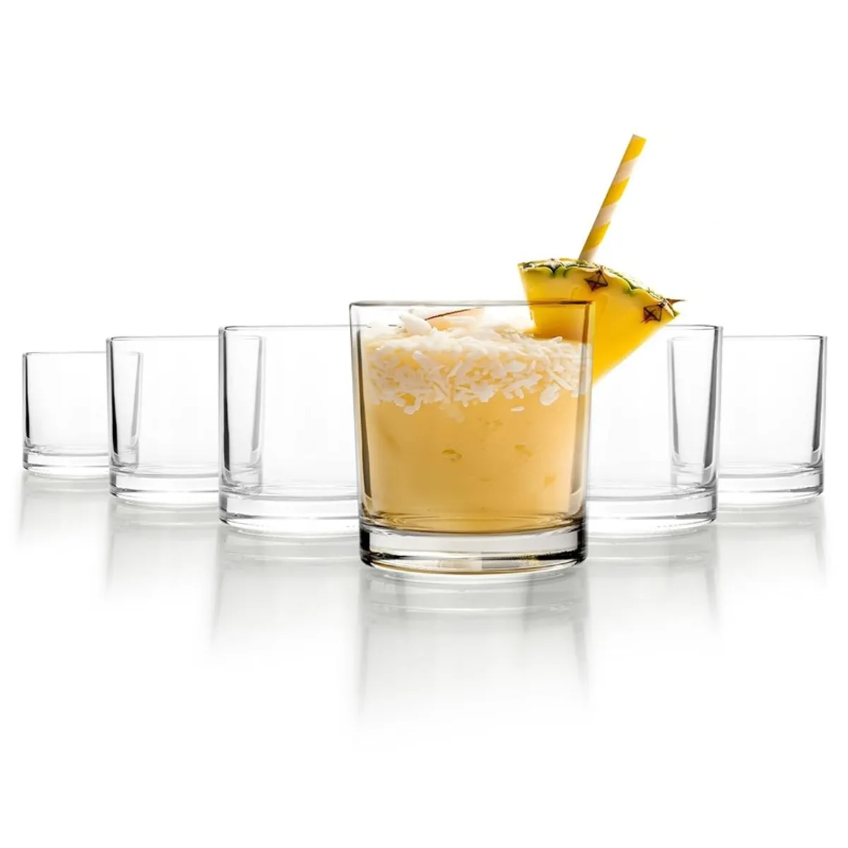 Six clear glasses displayed with a pineapple drink in the centre