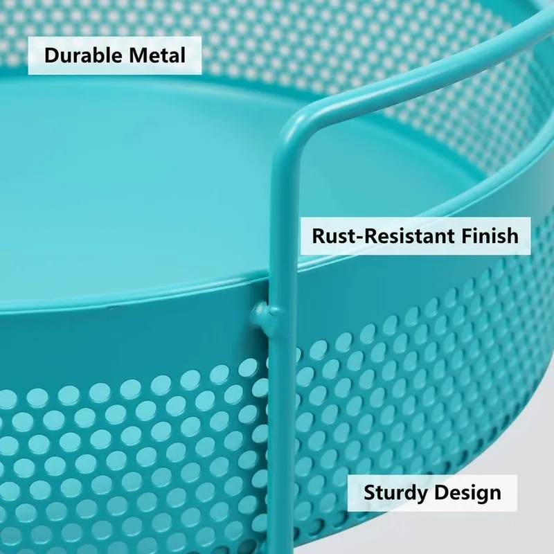 Close-up of blue metal basket with perforated sides and handle