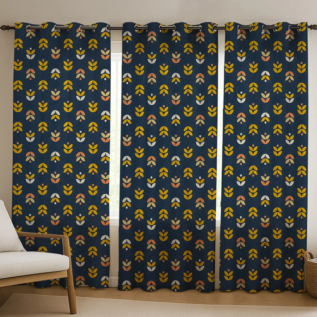 Three blue and yellow floral curtains styled across a wide window
