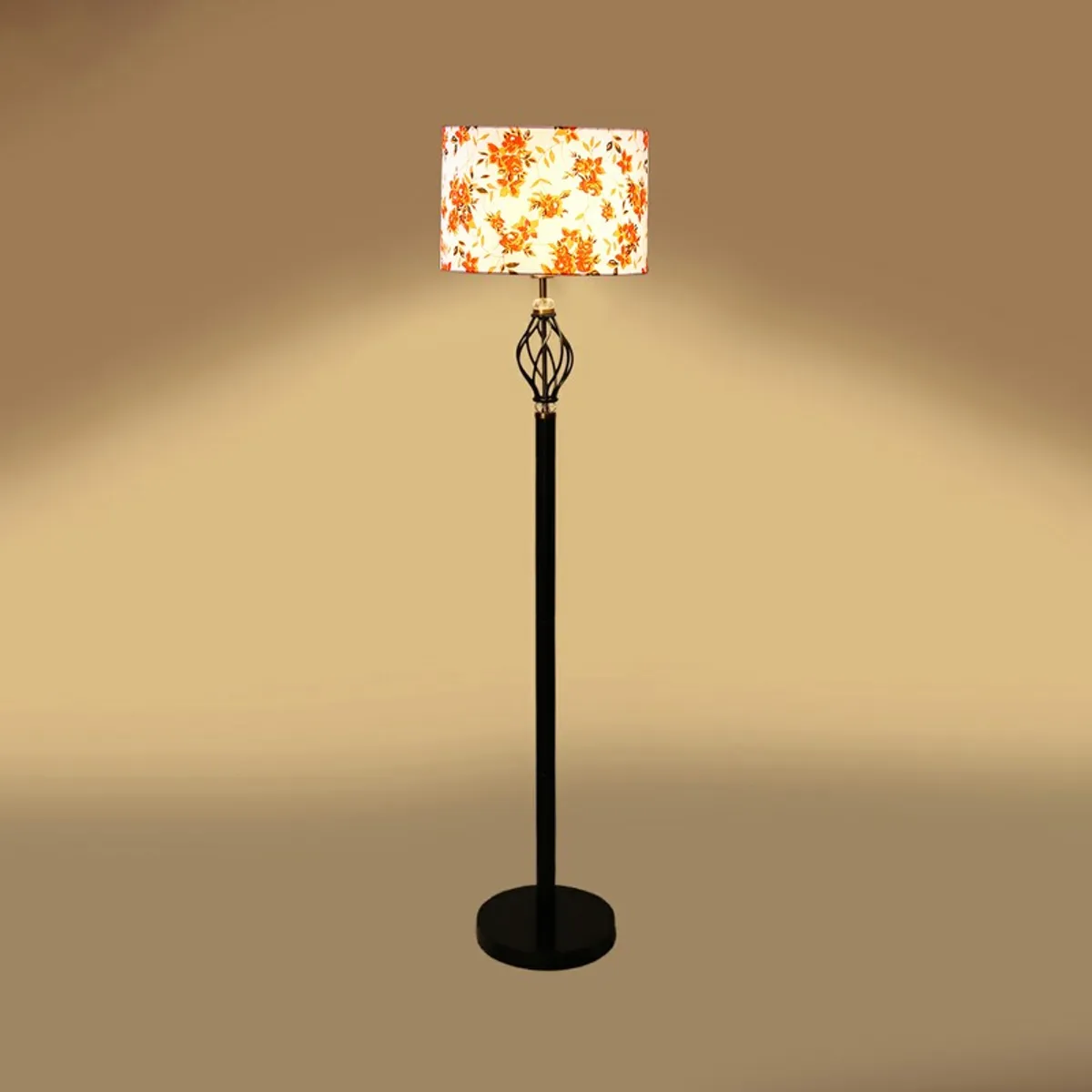 Floral floor lamp illuminated on a warm beige studio background
