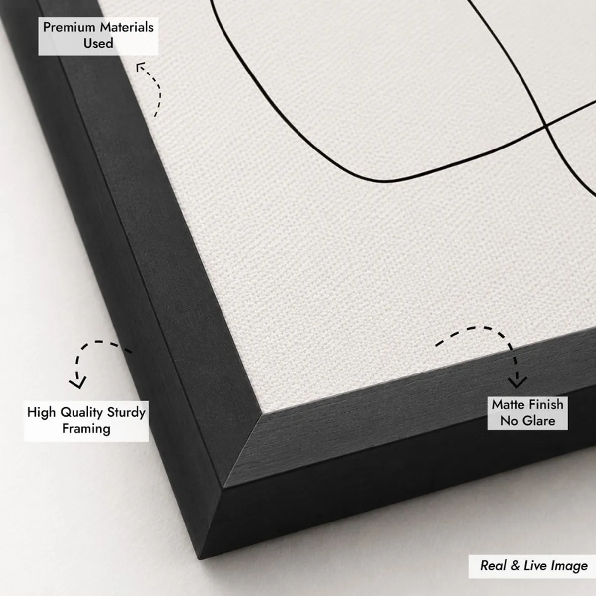Close-up of black frame and canvas texture with abstract line artwork