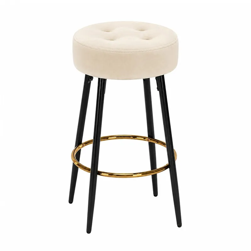 Off-white round bar stool with black legs and gold-toned ring footrest
