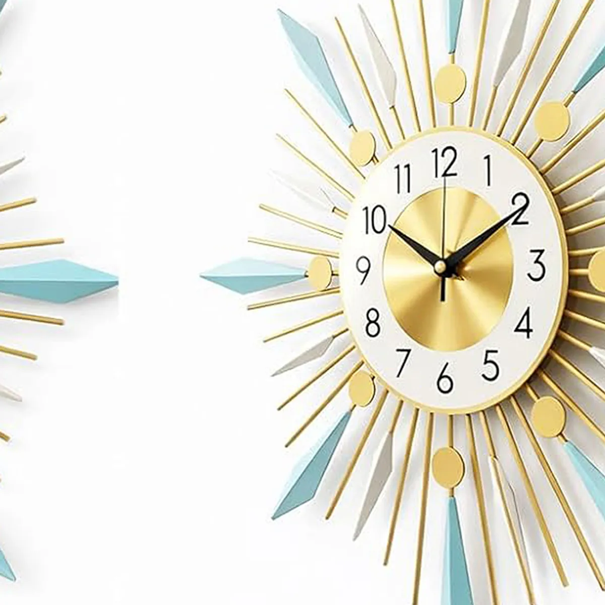 Close-up of the gold, white and blue sunburst clock face