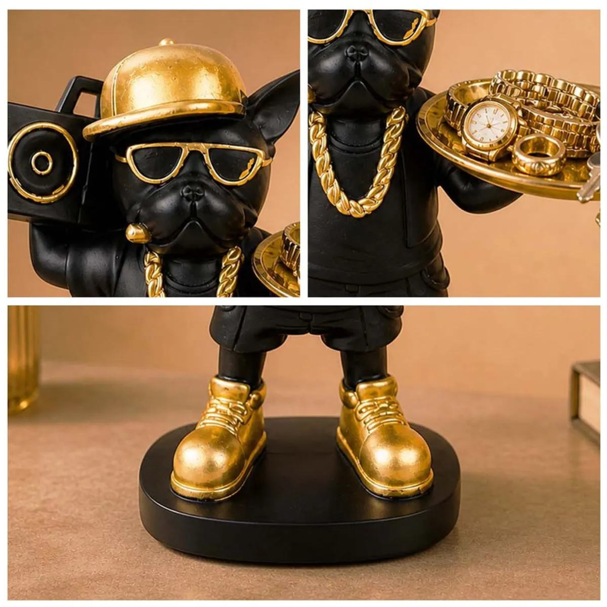 Close-up of the black figurine's gold accessories and rounded base