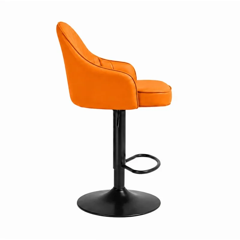 Side view of orange bar chair with curved back and black footrest